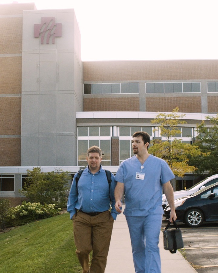 staff walking outside hospital