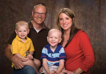 Dave and Becky Krause, with sons Benjamin (left) and William