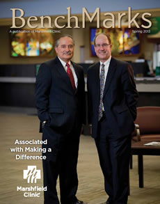 Cover photo: John Evans (left) and John  Baur of Associated Bank.