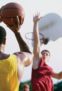 man playing basketball