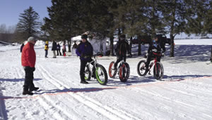 :Winterfest bikers brave the cold and snow to benefit childhood cancer care.
