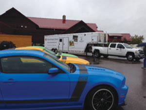 Shelby GT500s are lined up at the Cruise for a Cause, where the Clinic’s latest mobile mammography unit was also on display. 