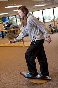 Athlete training on an balance board
