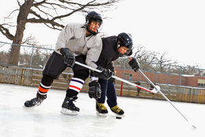Playing hockey on an outdoor rink
